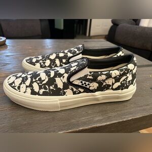 Vans Black & White Skull Pattern Slip-On Sneakers